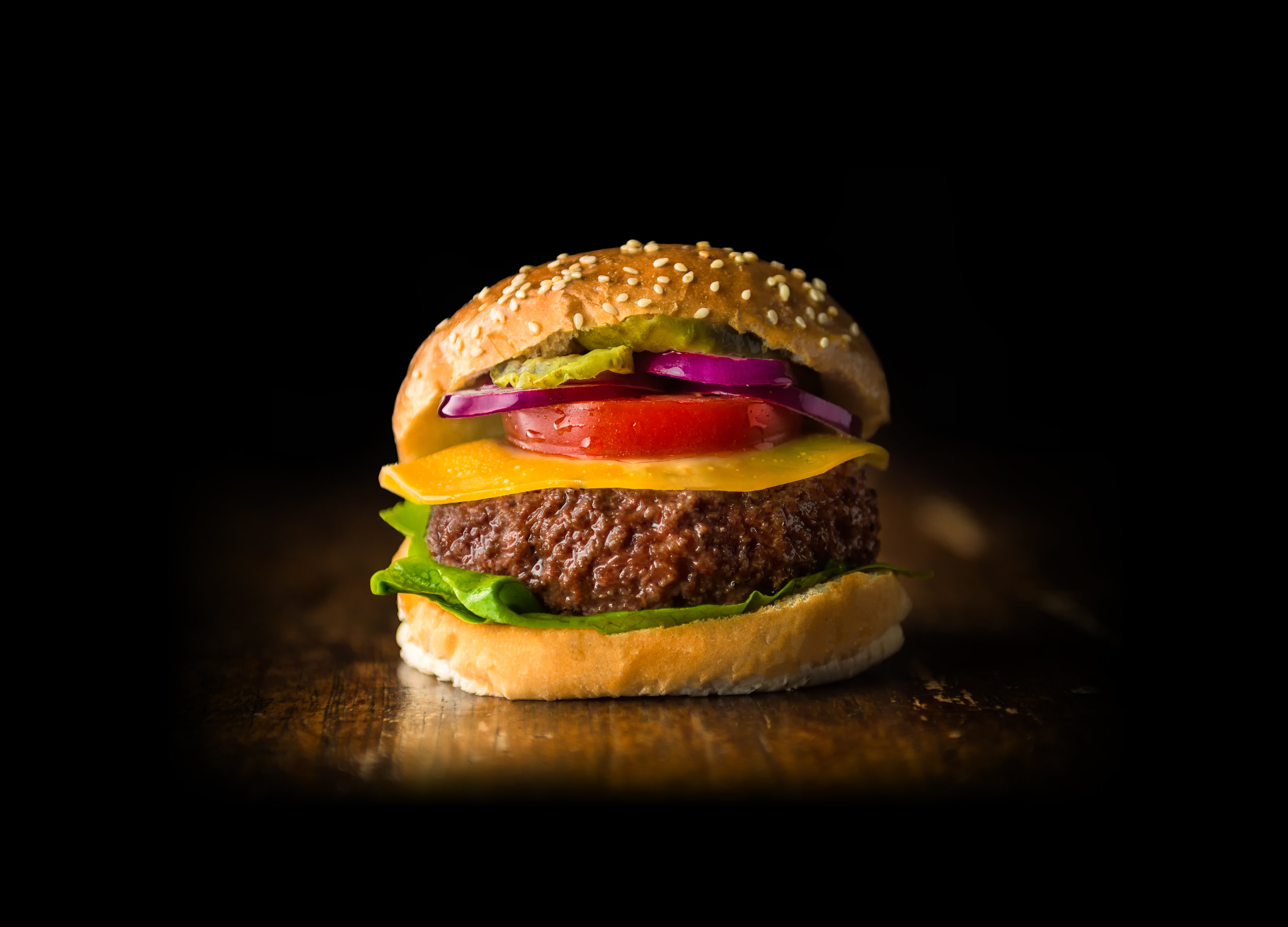 Photo shows a hamburger served at a 2013 tasting in London (possibly the first cultivated meat product ever tasted). Photo credit: Mosa Meat