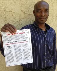 Lawson Snipes with his publication, the Spare Changer