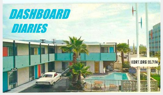 Bird's eye view of a vintage motel with Dashboard Diaries title