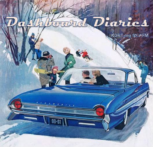 Vintage Oldsmobile in a winter scene with family playing in the snow