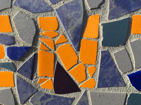 The letter N, photographed in the tile displaying the name of North Davis Elementary school 