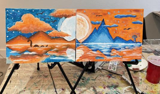 Photo of two paintings from a previous Paint Date