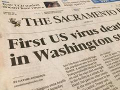 Front page of Sacramento Bee with COVID-19 headline